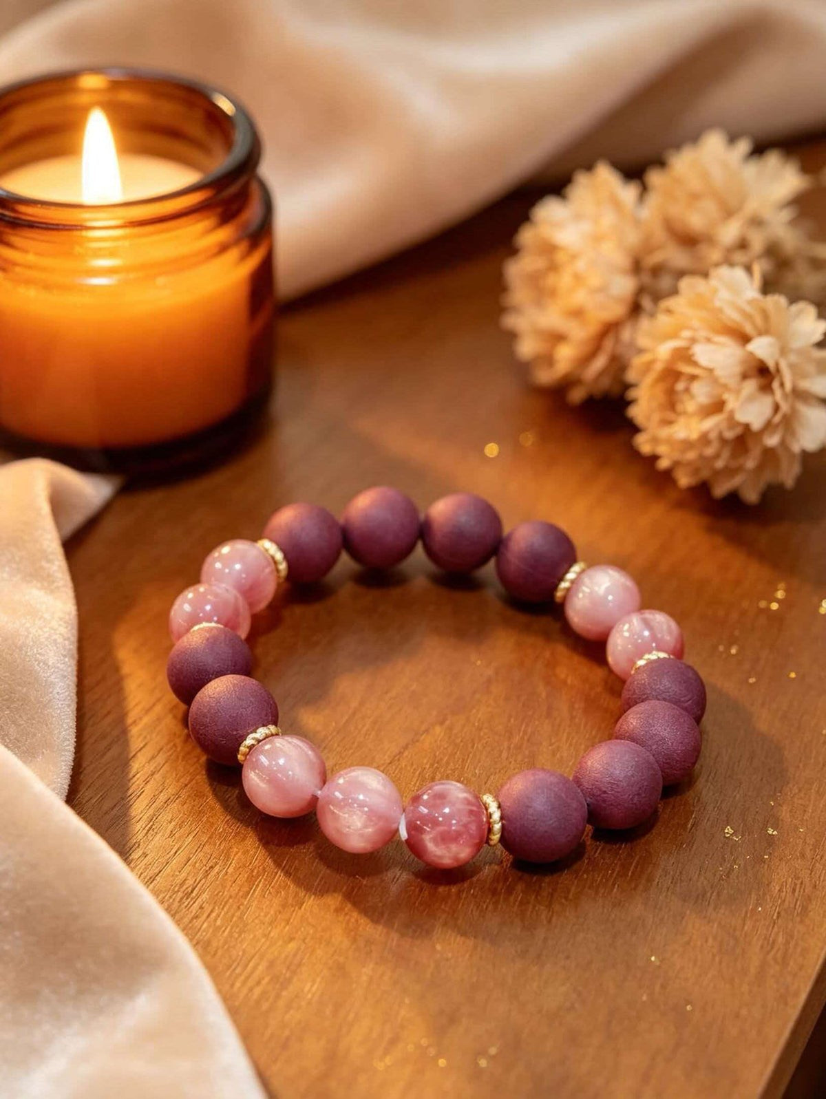 Rose quartz love bracelet worn on wrist