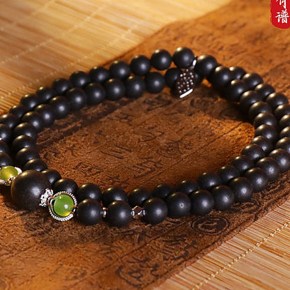 Gu Jin Xiang 'Xuan Zhi' Triple-Row 66-Bead Bracelet - natural hand-rolled incense bead bracelet detail