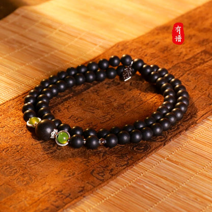 Gu Jin Xiang 'Xuan Zhi' Triple-Row 66-Bead Bracelet - traditional Chinese incense bead bracelet made by hand