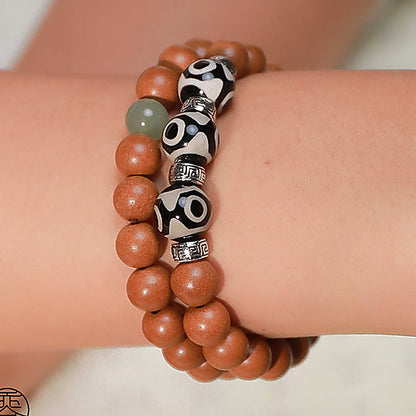 Osmanthus 'Three-Eye Dzi' Double-Row Bracelet - natural hand-rolled incense bead bracelet detail